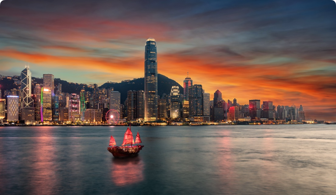 Hong Kong harbour skyline at sunset