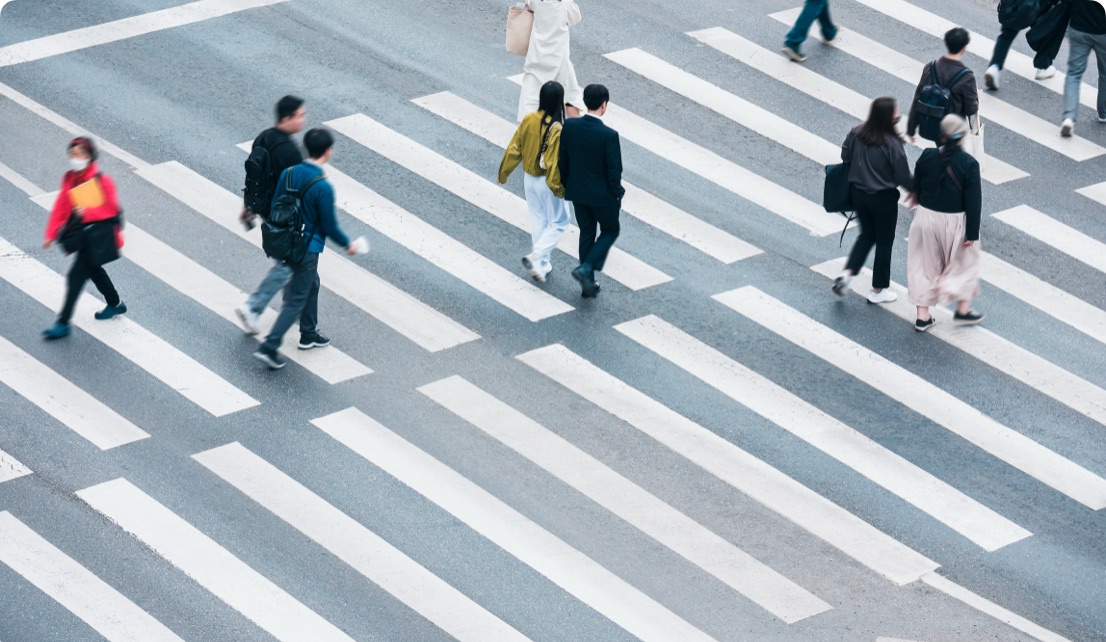 Pedestrians crossing a city street
